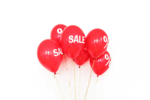 Red helium balloons with white logo