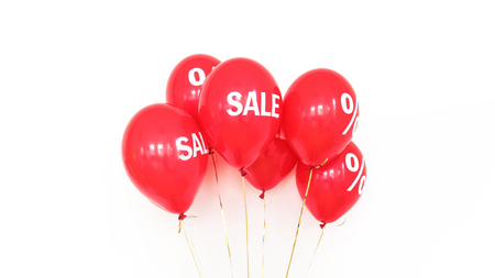 Red helium balloons with white logo